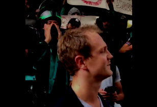 Deliveroo drivers surround Manager in front of company headquarters.